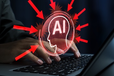 Cyber attacks against AI. Adversarial prompt injection attacks. Hacker attempting AI data and model poisoning using laptop computer.